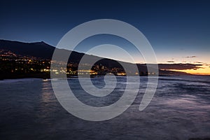 Scenic view of Punta Brava down a beach with Teide volcano in the background