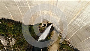 A scenic view of reservoirs and hydroelectric stations nestled in mountains