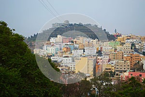 Scenic view of a residential hillside seen from Green Mountain in Abha, Saudi Arabia photo