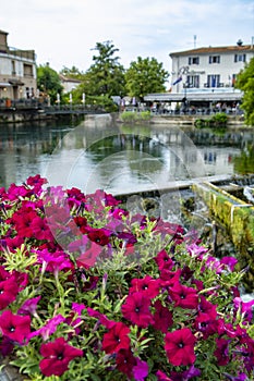 Scenic view on river Sorgue in colorful old town Lisle-sul-la-Sorgue in Provence, France