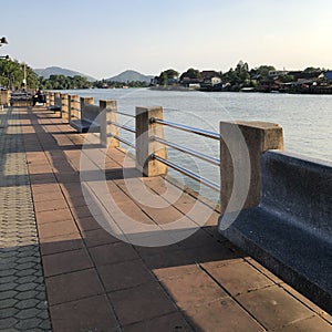 Scenic view of riverfront against sky