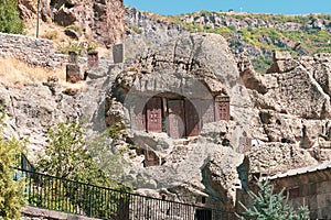 Armenia, Geghard, September 2021. Ancient Armenian khachkars on the rocks near the old monastery.
