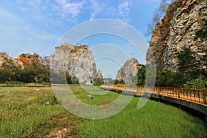 Scenic view of rocky mountain and walkway of khao Ngu Stone Park , Ratchaburi , Thailand.