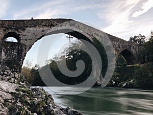 Scenic view of the Roman Bridge on the Sella River in Cangas de Onis, Spain