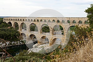 Scenic view of Roman built Pont du Gard aqueduct, Vers-Pont-du-Gard in South of France.