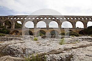 Scenic view of Roman built Pont du Gard aqueduct, Vers-Pont-du-Gard in South of France.