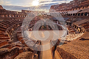 Scenic view of Roman Colosseum interior at sunset
