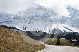 Scenic view of the Santis mountain with a highway road and a small house in the foreground