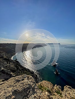 Scenic View Of Sea Against Clear Blue Sky - stock photo