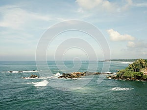 Scenic view of the ocean against blue sky in Galle, Sri Lanka