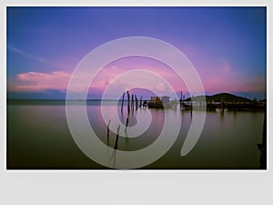 Scenic view of sea against sky at sonset