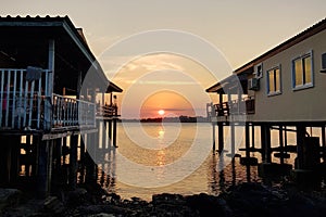 Scenic view of sea against sunset sky