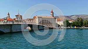 Scenic view from the sea to the bridge and architecture of the city of Trogir, Croatia