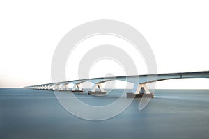 Scenic view of the Sealand Bridge in The Netherlands under the clear blue sky