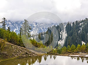 Scenic view of a Siri Paye pond in Kaghan valley, Pakistan photo