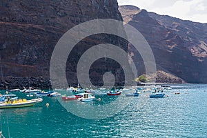 Scenic view on the small port of Vueltas  from Playa de Vueltas in Valle Gran Rey on La Gomera. Boats in the lagoon