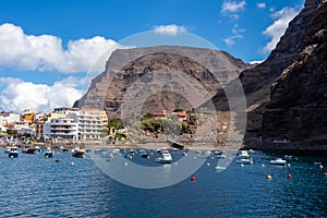 Scenic view on the small port of Vueltas  from Playa de Vueltas in Valle Gran Rey on La Gomera. Boats in the lagoon