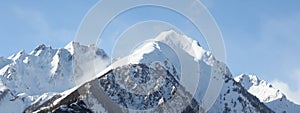 Scenic view on a  snow covered mountain ridge with copy space for your text