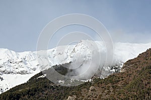 Scenic view on a  snow covered mountain ridge with copy space for your text