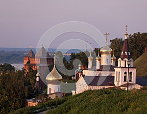 Scenic view at St. Elijah`s Church, domes of Church of St. John the Baptist and guard towers of of Nizhny Novgorod Kremlin