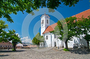 Scenic view of St. John Catholic parish church in old town of Szentendre, Hungary at sunny summer day