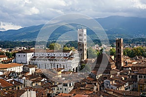 Scenic view of St. Martin Cathedral (Chiesa di San Martino) with bell tower from Torre delle Ore. Location Lucca, Tuscany, Italy. photo