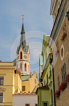Scenic view of St Vitus church tower and old buildings in Cesky Krumlov, Czech Republic