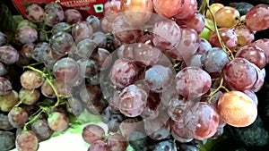 Scenic view of stocked fruits of red grapes