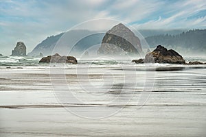 Scenic view of sunset at Haystack Rock,Cannon beach, Oregon