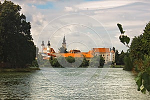 Medieval Architecture.State Chateau TelÃÂ and pond in the city of Telc, CZ. photo