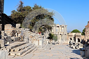 Scenic view to the ruins of library of celsus in acient city Ephesus in Turkey under blue sky
