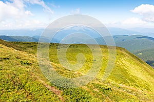 scenic view in to the valley. cumulus clouds above horizon photo