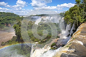 Panoramic view from top of the waterfalls with a rainbow to Iguazu river and San Martin Island, Iguazu Falls, Argentina photo