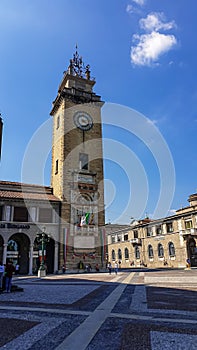 Bergamo - Scenic view of tower Torre dei Caduti, Monument Tower in the Piazza Cavalieri di Vittorio Veneto square photo