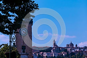 Bergamo - Scenic view of tower Torre dei Caduti, Monument Tower in the Piazza Cavalieri di Vittorio Veneto square photo