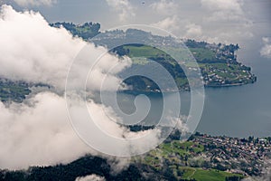 Scenic view of a town and river in the distance with clouds around, Lucern, Switzerland