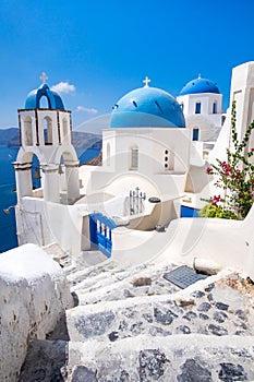 Scenic view of traditional cycladic white houses and blue domes