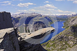 Scenic view of Trolltunga the famous Troll`s tongue Norwegian destination and Ringedalsvatnet Lake in Odda