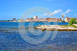 Scenic view of Umag old town, Istria, Croatia. Summer landscape with medieval architecture, blue sea and sky, travel background
