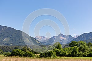 Scenic view of untamed mountain peaks of Karawanks seen from Feistritz im Rosental, Carinthia, Austria. Majestic Wertatscha and