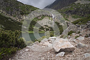 Scenic view of Velicke Pleso Velicke Tarn and waterfall in High Tatras mountains, Slovakia. Beautiful clean nature in Central