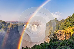 Scenic view of Victoria Falls with rainbow on the border between Zambia and Zimbabwe