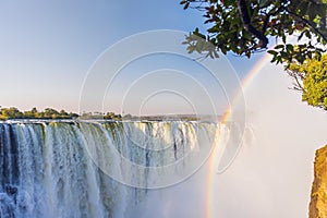 Scenic view of Victoria Falls with rainbow on the border between Zambia and Zimbabwe