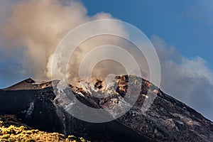 Scenic view of a volcano blowing off smoke as it's about to erupt photo