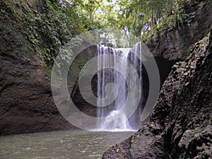 a scenic view waterfall in Bali.