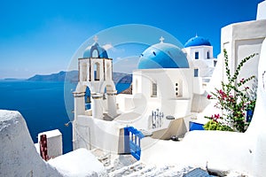 Scenic view of white houses and blue domes on Santorini