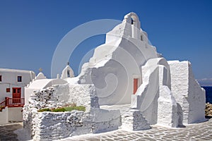 Scenic view of whitewashed church Panagia Paraportiani, Mykonos, Greece