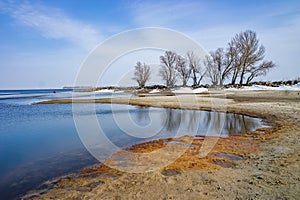 Scenic view of winding shoreline of Dnieper river, Cherkasy, Ukraine at early spring day