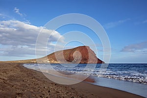 Scenic views of Montana Roja from the beach Playa Tejita, Tenerife, Canary Islands, Spain photo