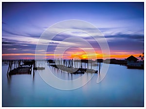 Scenic vlew of lake against sky sunset